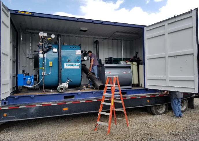technician working on boiler